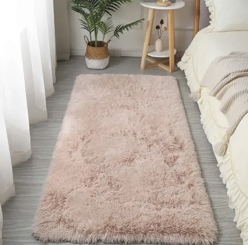 cream shaggy area rug